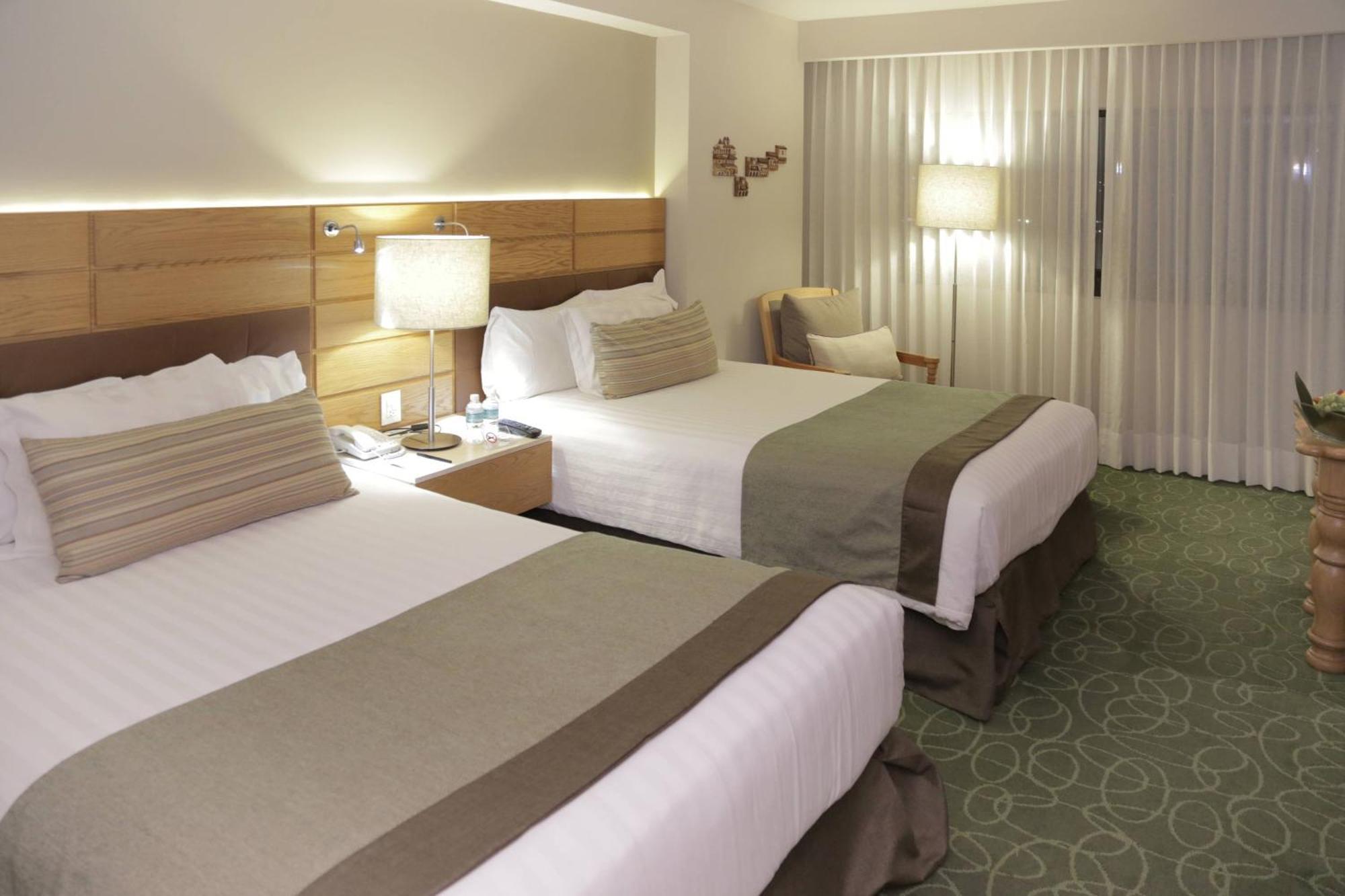 Marriott Tuxtla Gutierrez Hotel Exterior foto A room at the Hilton Garden Inn